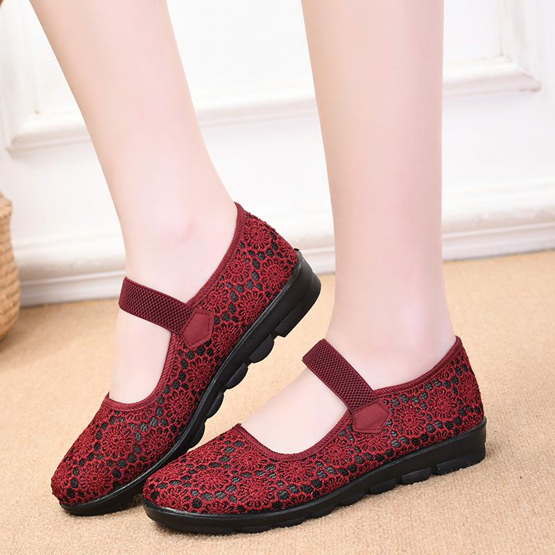 Summer new cloth shoes women's flying woven hollow breathable medium and old soft sole one pedal casual shoes