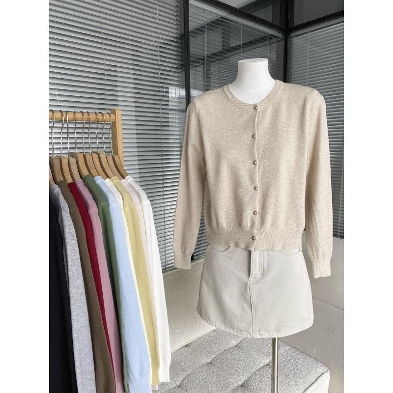 Korean simple round neck singlebreasted candycolored knitted cardigan women's new early autumn gentle wind longsleeved jacket