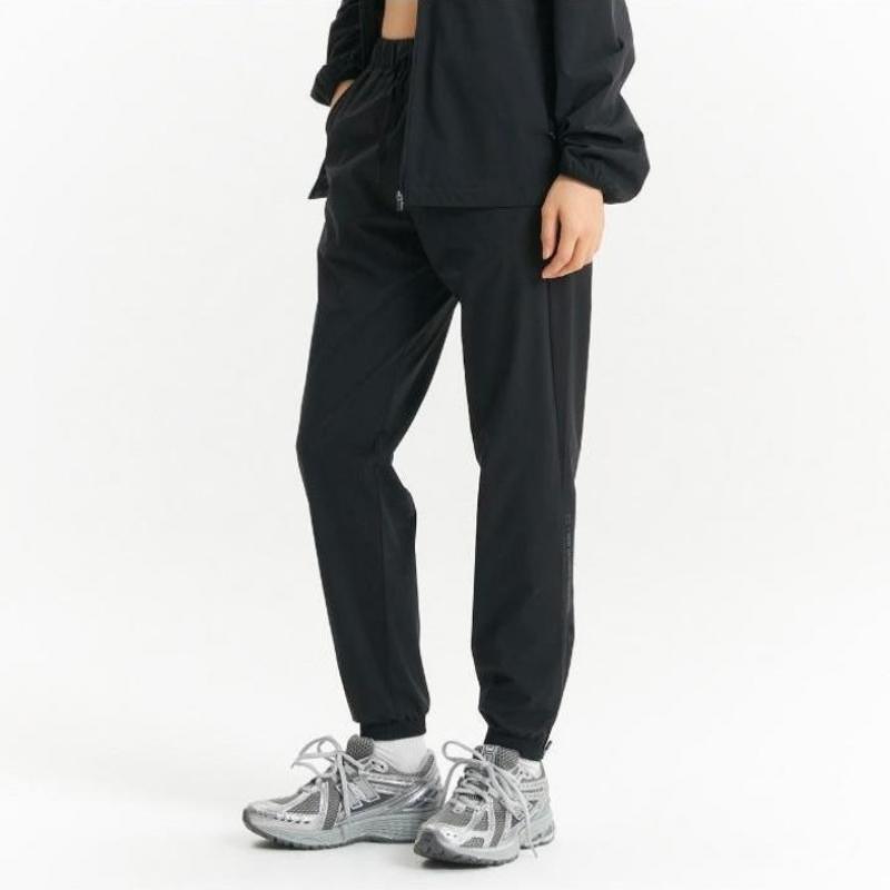New Balance Pantaloni de jogging unisex de performanță Nbnte12333