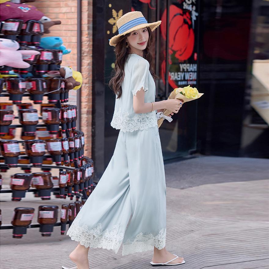 Fashion temperament casual suit women's summer new temperament lace splicing light top wide leg pants two-piece set