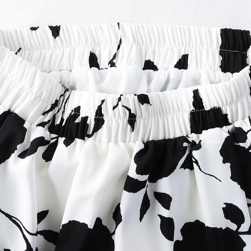 Nová sukně s vysokým pasem, potiskem, úzkého střihu, středně dlouhá, s velkým kyvadlem