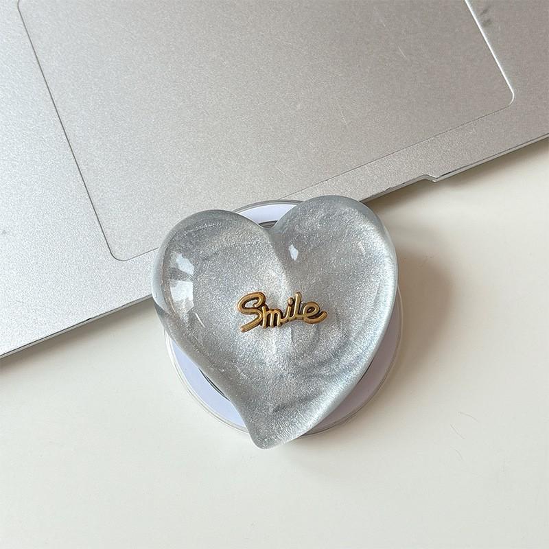 

Mobile Airbag Holder Magnetic Suction Magsafe Love Glitter Solid Color Telescopic Desktop Support Lazy People Watching Dramas Wholesale
