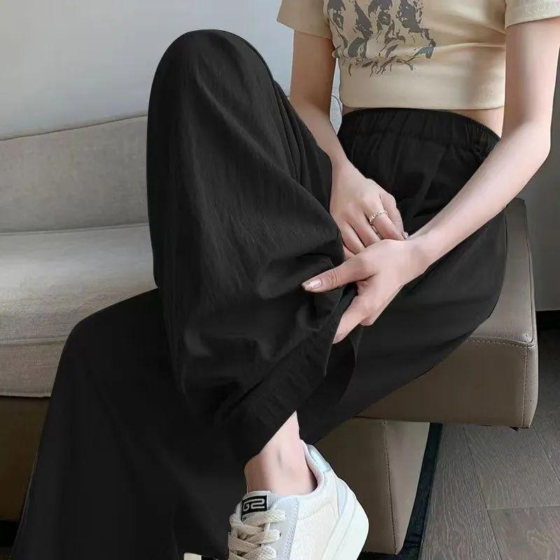 Ice Silk Women's High-Waist Pleated Wide-Leg Pants for Spring, Summer, and Autumn.
