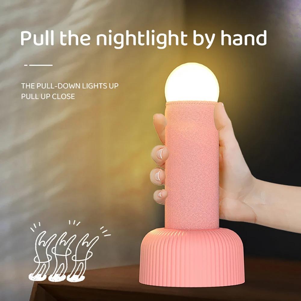 Interest Handheld Night Light Creative LED Sleeping Lamp Original Design Unique Switching Method Has A Base for Placing on Table