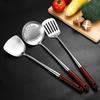 Stainless Steel Spatula with Extended Wooden Handle - High-Temperature Resistant, Anti-Scald Kitchen Utensil for Frying and Stir-Fry Cooking.