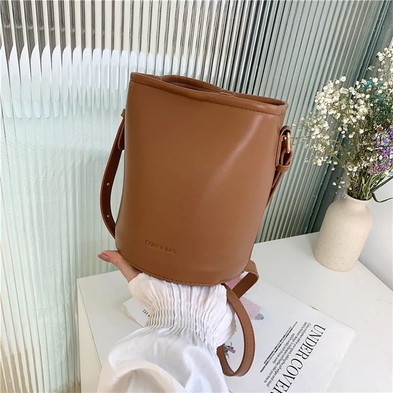 Women's PU Leather Crossbody Bags Contrasting Colors Casual Solid Trendy Lock Bucket Type