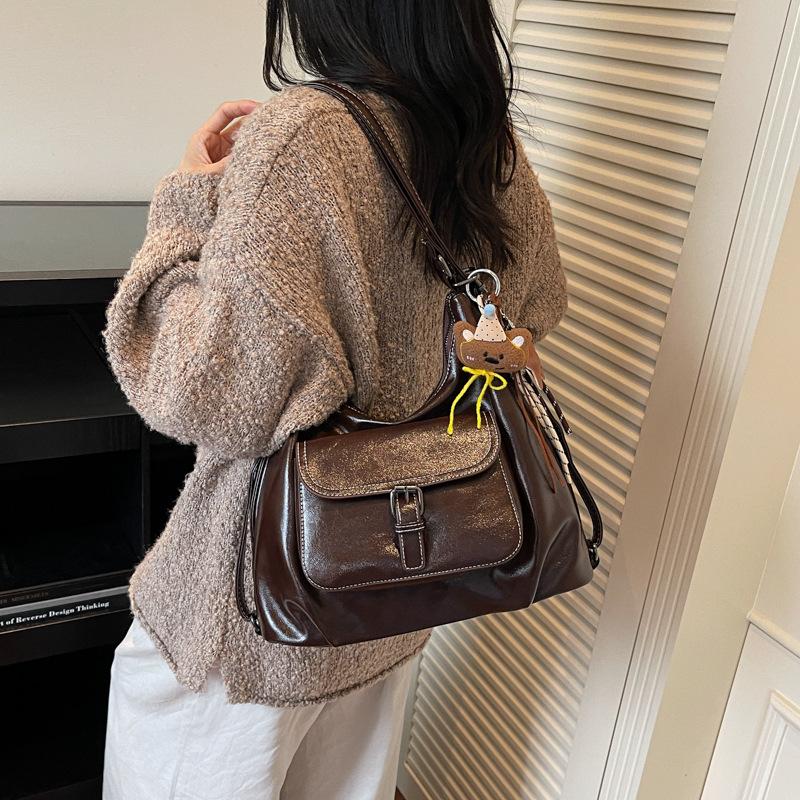 Casual large capacity retro bag women 2025 new versatile shoulder bag double shoulder backpack commuter bucket bag