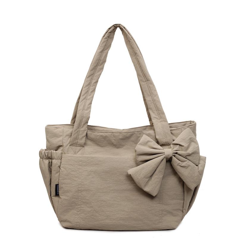 

Fresh and simple quilted bow shoulder bag for women, solid color versatile casual tote bag, lightweight commuter laptop handbag хакі