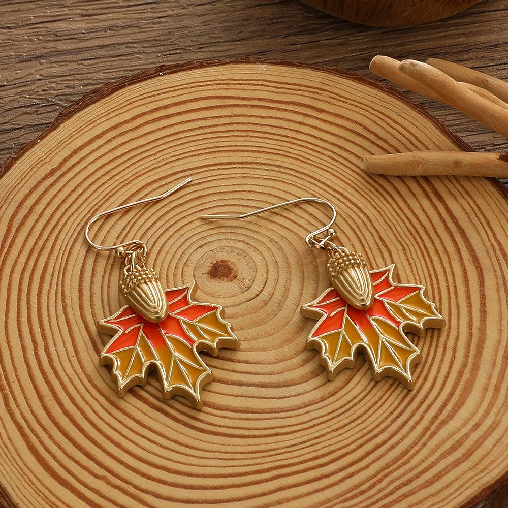 2026 Retro Red Zircon Maple Leaf Stud Earrings – Light Luxury Fashion Jewelry for Women