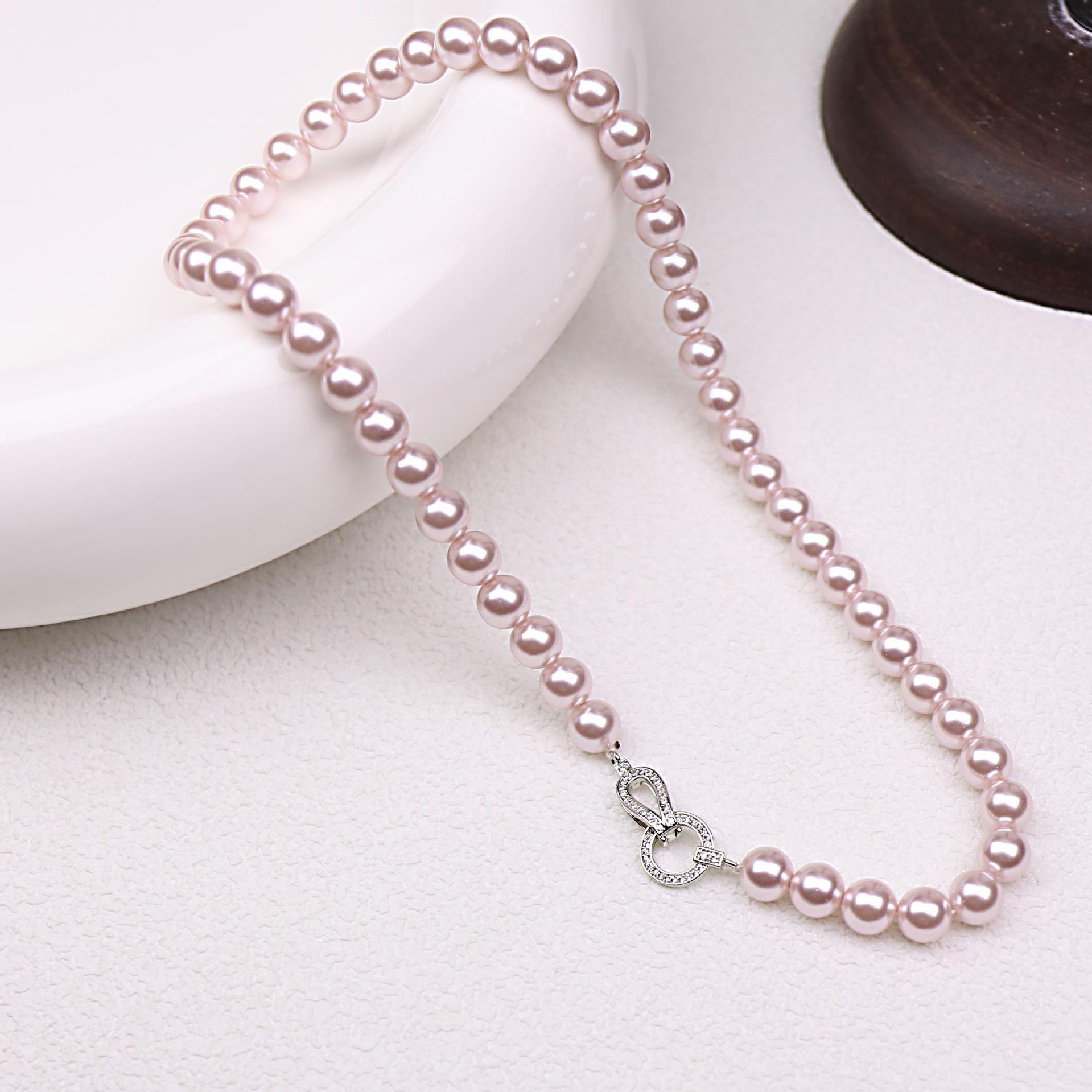 

Кольє-чокер з дрібних перлів з високим блиском для жінок у кольорі Manta Rose Purple – Елегантний та розкішний дизайн