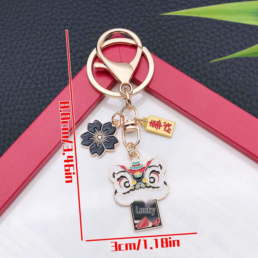 Six-Color Oil Drip Cartoon Chinese Style Keychain: Four-Leaf Clover, Cherry Blossom, Lion Pendant for Backpack