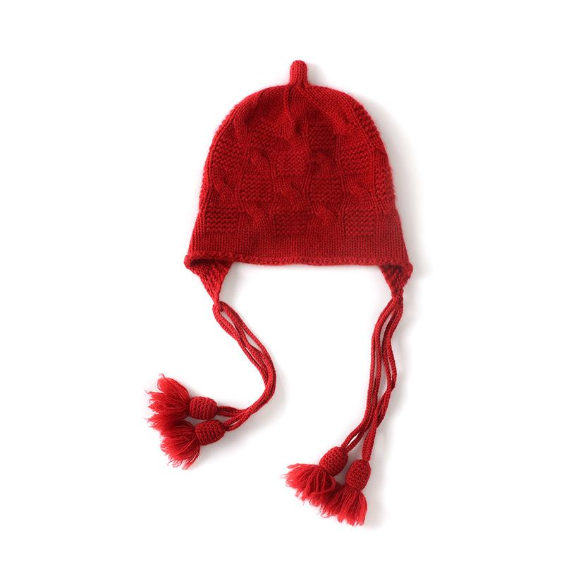 Autumn and winter new commuter women's knitted wool hat warm ear protector fringed pendant handmade twist all-match hat