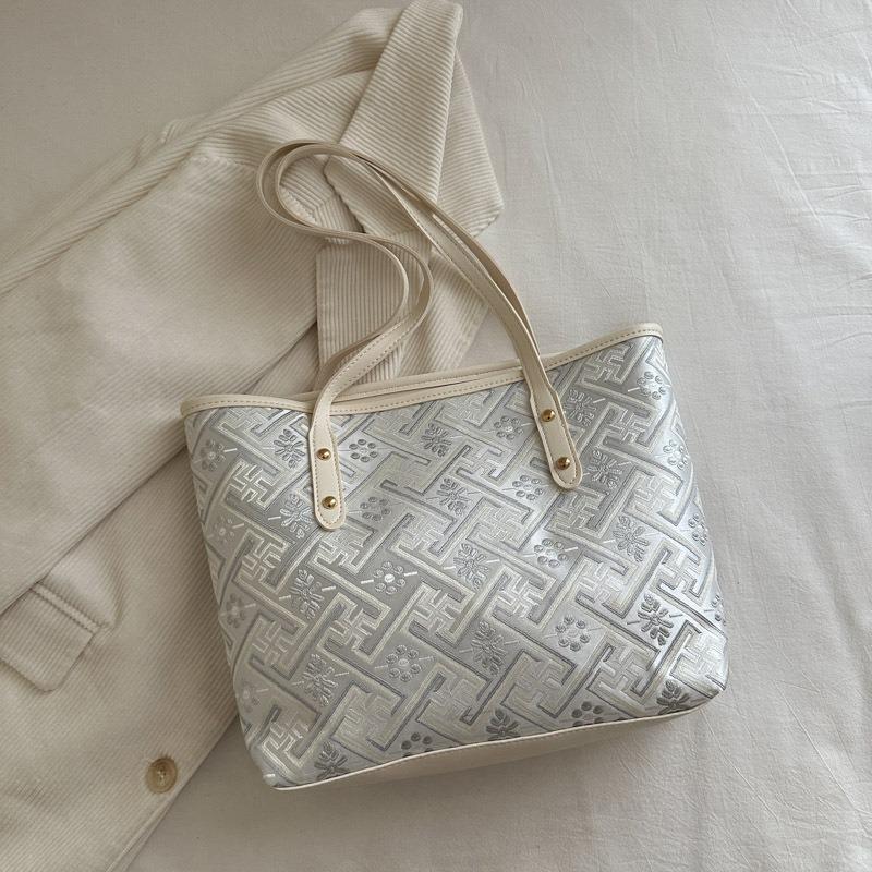 

Xia s new portable small bag, women s tote bag, fashionable, sweet and exquisite commuting large-capacity shoulder messenger bag.