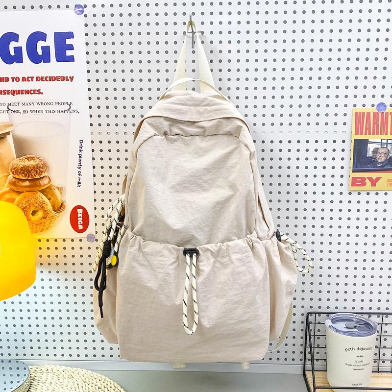 Schoolbag Solid Color Nylon Backpack Women's 1011 Summer New Large Capacity Middle and High School Student School Bag Lightweight Travel Bag