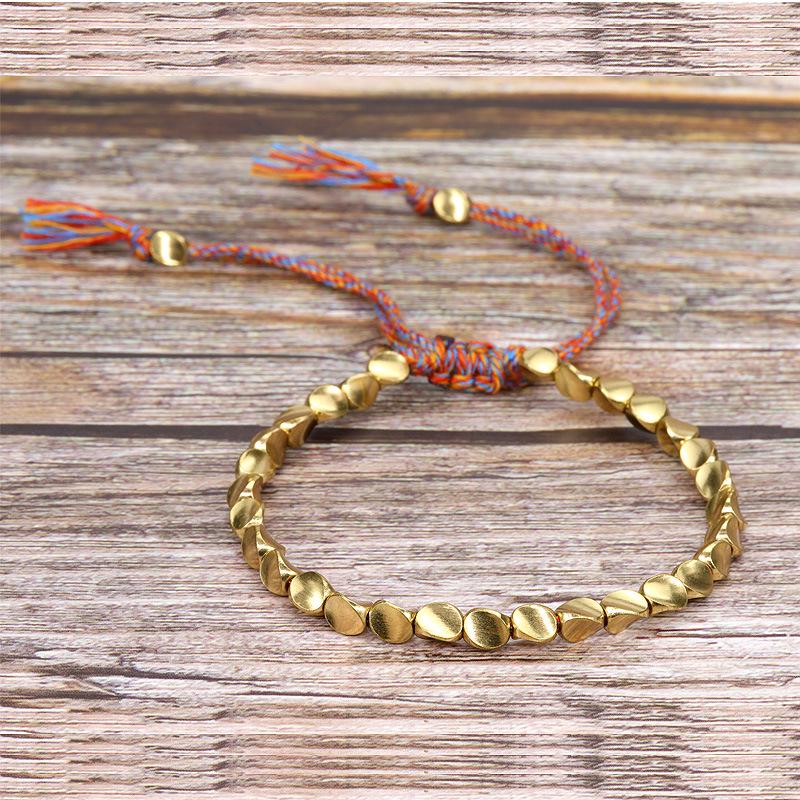 Handmade Woven Bracelet with Irregular Copper Beads and Creative Tassel Drawstring