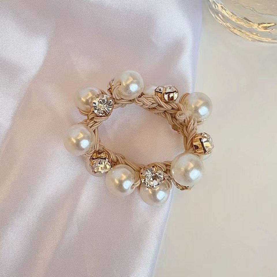 "Versatile Pearl Hairband: High-Elastic Luxury for Stylish Buns and Ponytails"