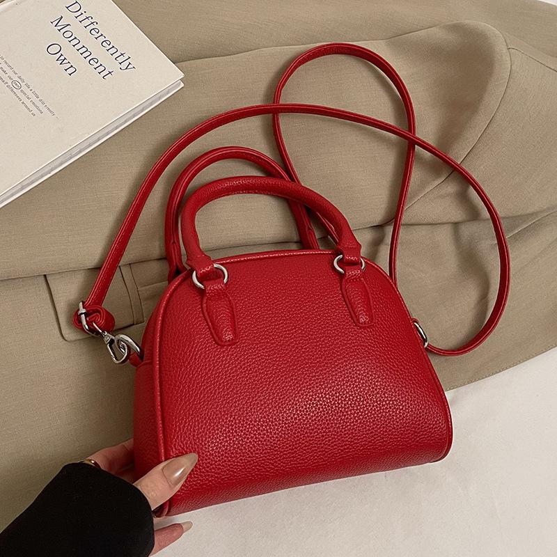 Wholesale new niche simple lychee pattern texture portable Boston bag versatile temperament commuter messenger bag woman
