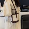 This year, the popular contrasting color bucket bag women's 2025 new niche fashion portable shoulder bag high-end messenger bag