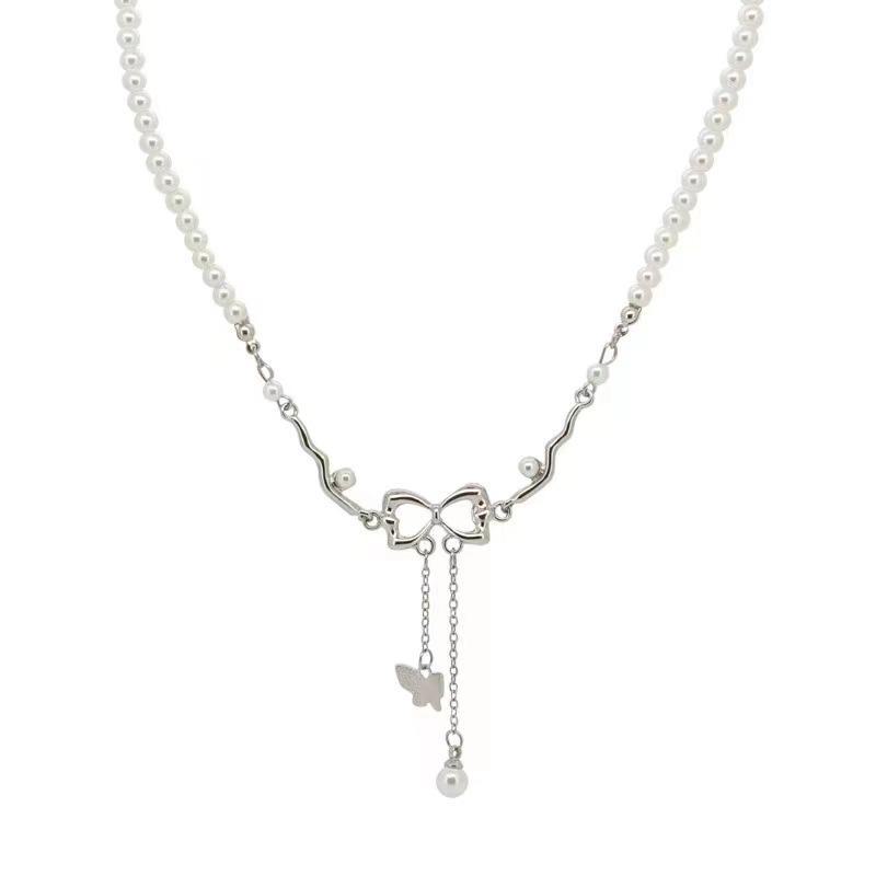 Hollow Bow Tassel Pearl Necklace for Women - Luxury Niche Design Clavicle Chain, 2025