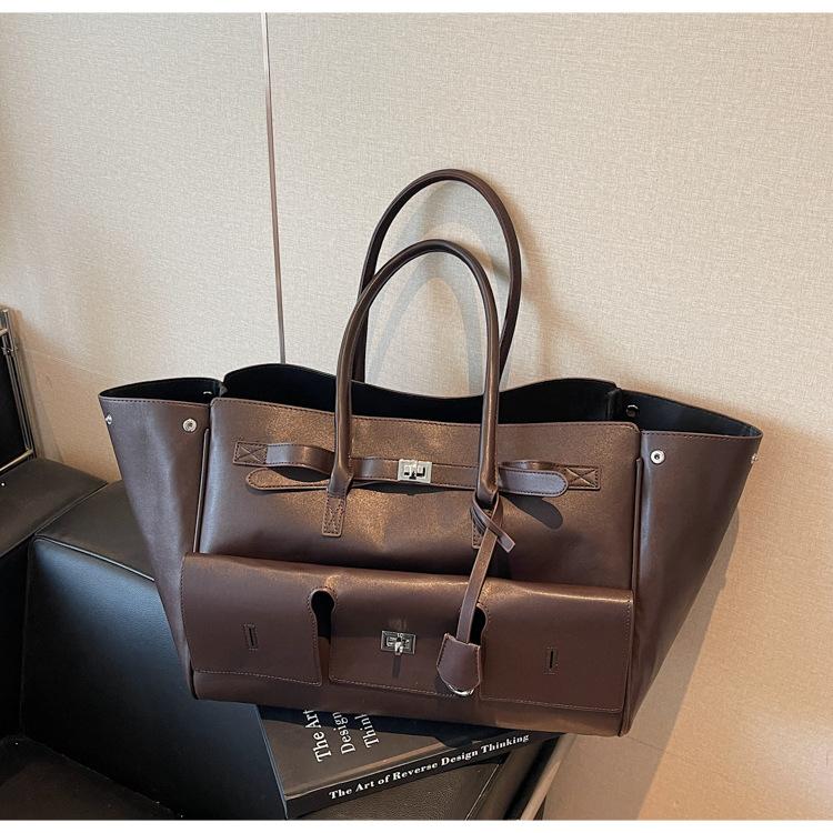 

2025 large-capacity trend shoulder women s bag autumn and winter new niche design fashionable portable commuter tote bag темно-коричневого