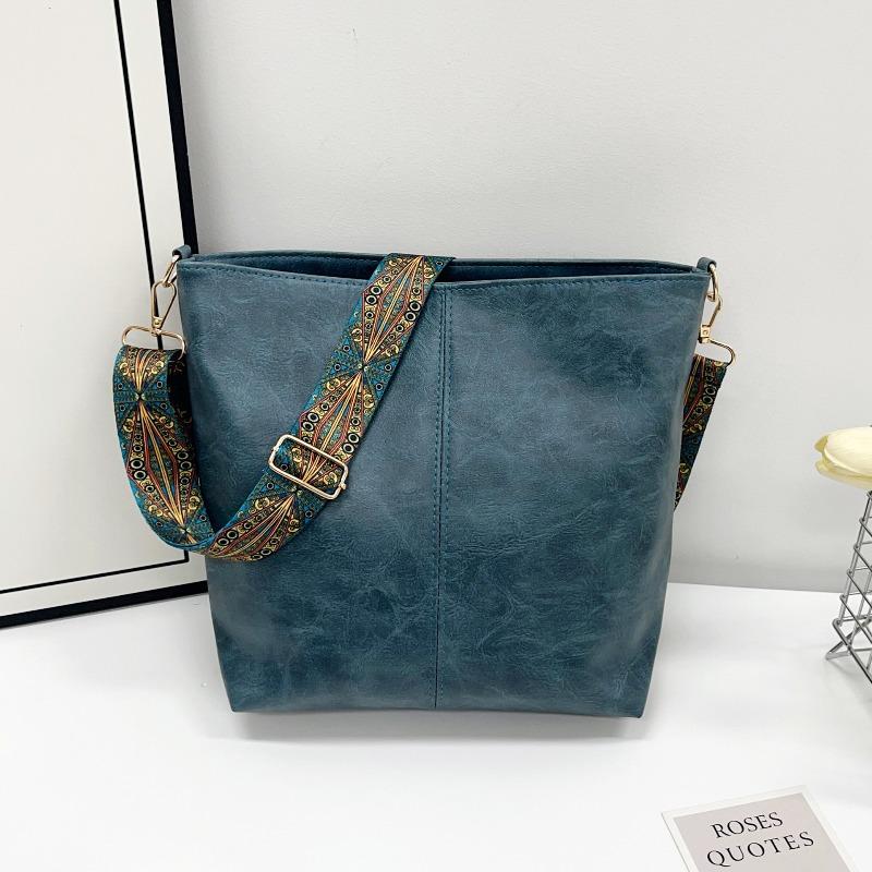 Large-capacity Bag Women's Spring and Summer New Retro Broadband Shoulder Messenger Bag Premium Texture Commuter Bucket Bag