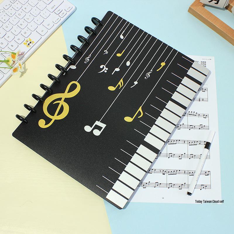 

Папка для нот формата А4 с грибковым зажимом, с многоразовыми, съемными прозрачными вставками для гитары и фортепиано Mushroom Clip Music Score - 10 Pages