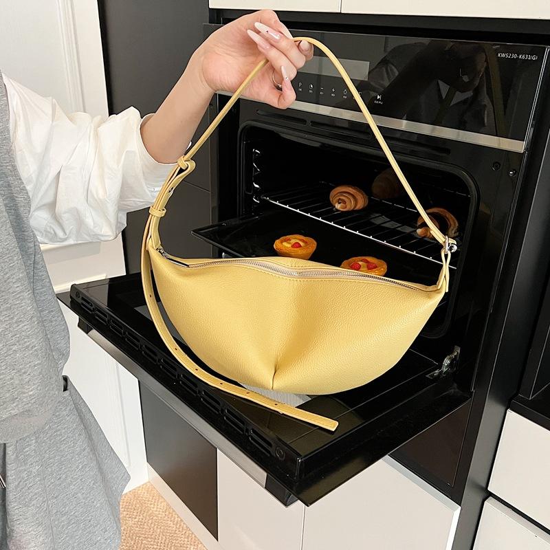 

Премиальная сумка женская 2025 новая на плечо сумка-пельмень модная универсальная вместительная сумка-мессенджер подмышечная сумка-полумесяц 40*4*19