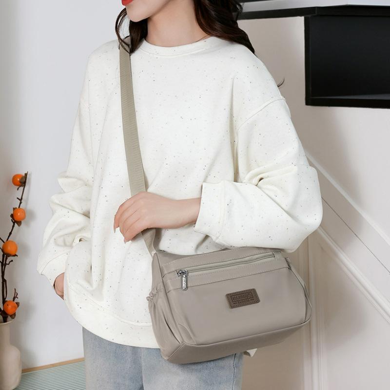 New simple and versatile messenger bag large capacity lightweight mother bag solid color
