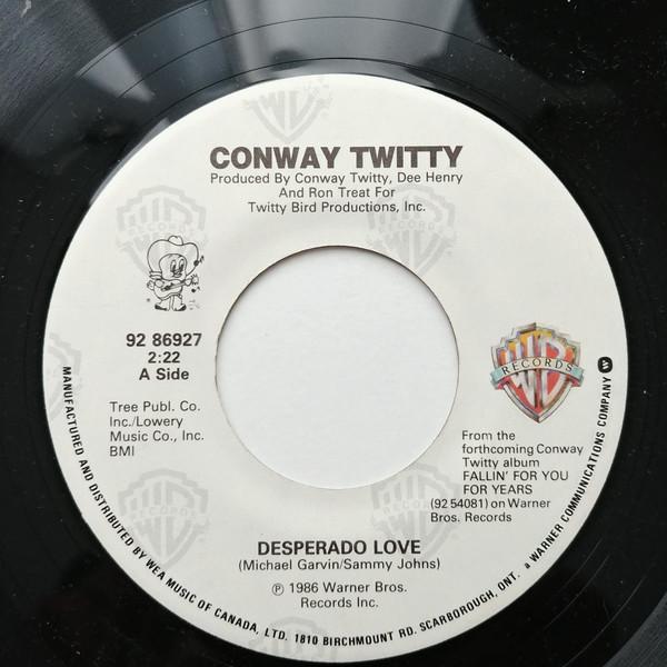 7-дюймовая пластинка CONWAY TWITTY - Desperado Love 9286927 Warner Bros. Канада 1986 г. Страна/Народная Почтовая марка