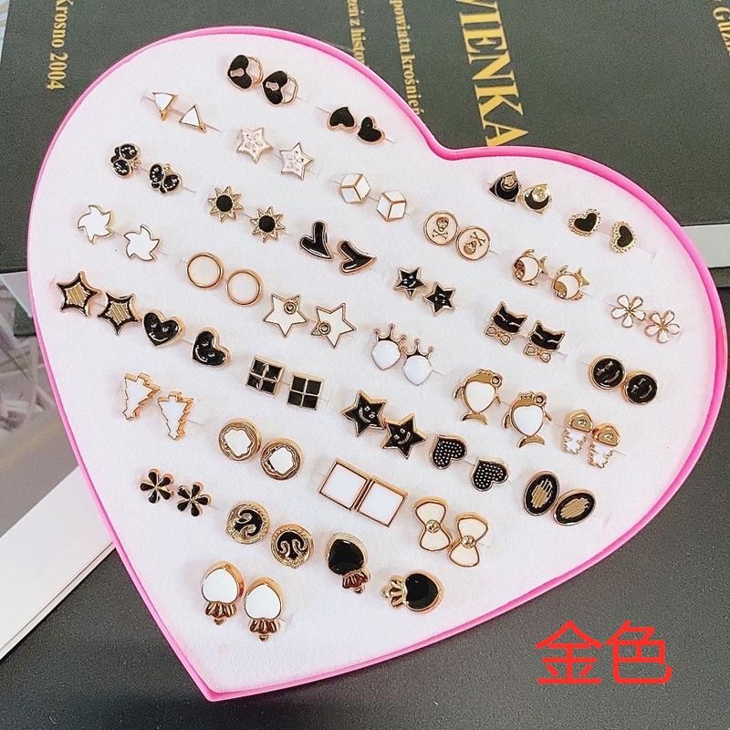 

36 Pairs Ladies heart-shaped box-packaged stud earrings and hoop earrings made of soft plastic jewelry accessories золотой