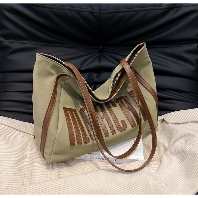 

Tote bag women s large-capacity bag, new niche portable shoulder bag, college student class commuter bag