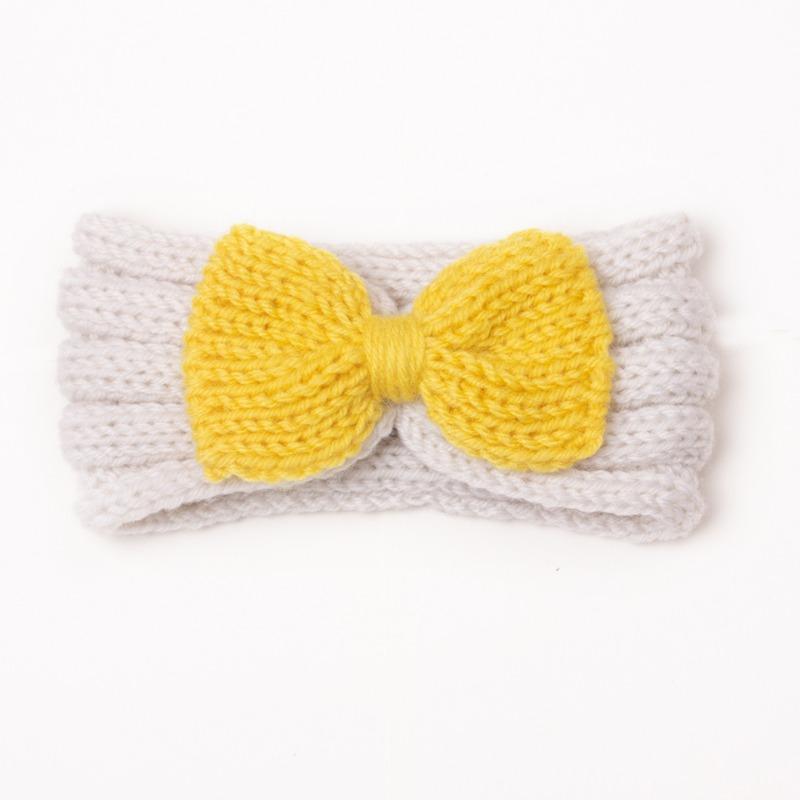 Autumn and winter warm children's contrasting color knitted wool hair accessories, baby solid color bow headscarf, baby headband