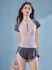 Women's Sporty Two-Piece Swimsuit: Short Sleeve, Tummy-Slimming, Ideal for Hot Springs or Pool.