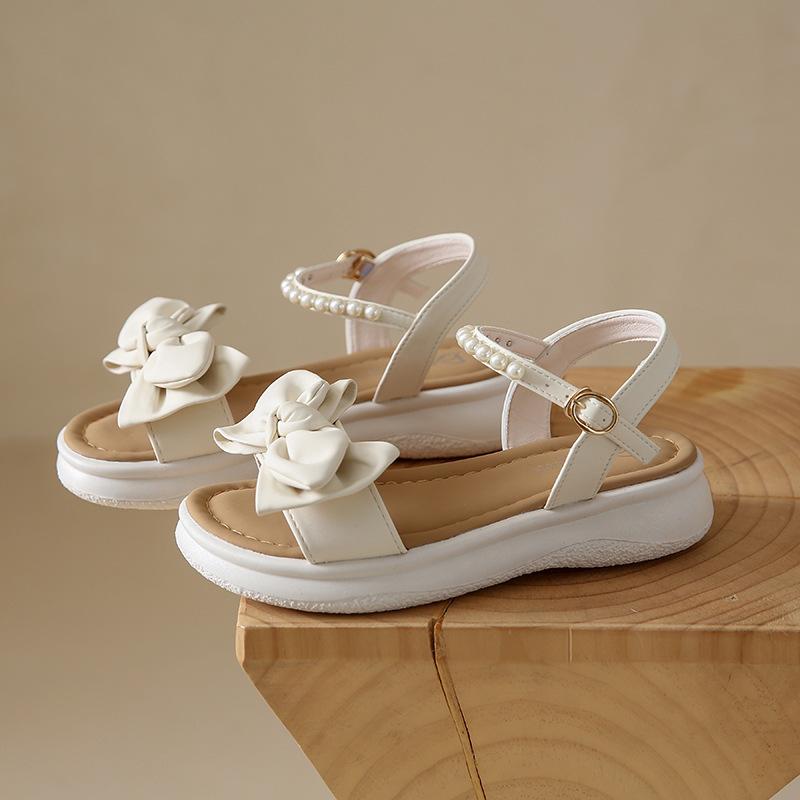 Sandals women's summer new thick-soled versatile pearl bow soft-soled skirt fashion beach shoes