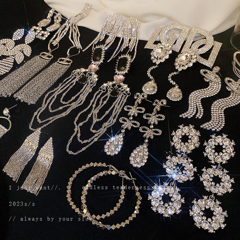 European and American Exaggerated Diamond-encrusted Flower Bow Fringed Earrings Personalized Earrings Internet Celebrity Temperament Earrings