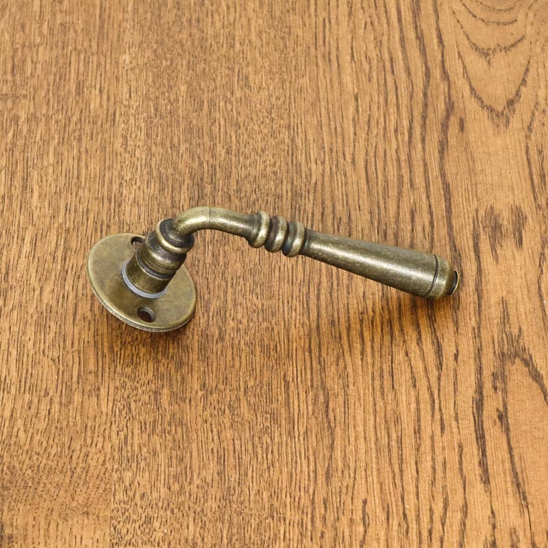 Manija de puerta DEVON con roseta ORO ANTIGUO