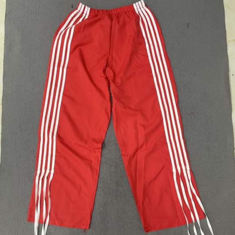 2025 günlük moda çok yönlü spor tarzı dört şeritli kontrastlı düz paça pantolon ilkbahar ve yaz için