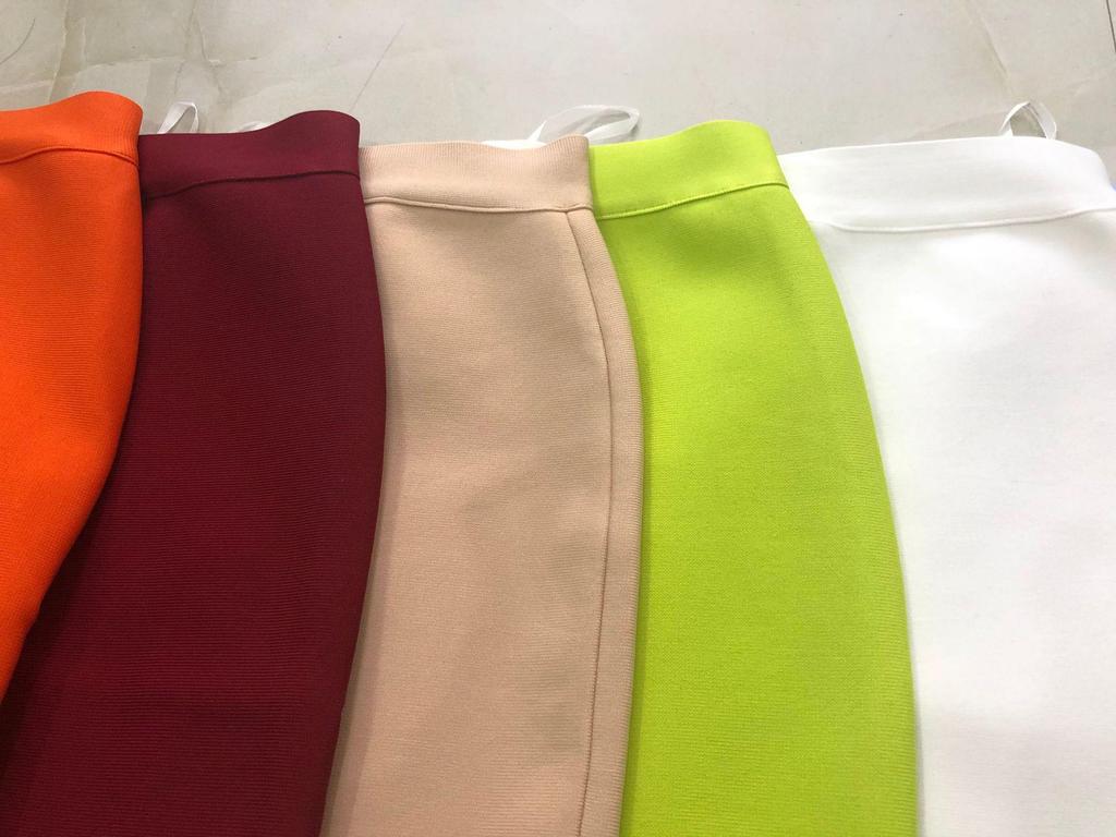 Szykowna spódnica bandażowa midi: Elegancki krój z wysokim stanem, elastyczny, dopasowany do bioder