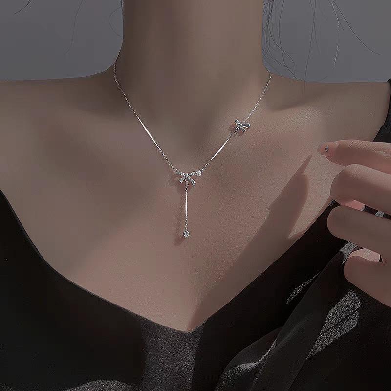 Elegant S925 Sterling Silver Bow Tassel Necklace: Luxury Clavicle Chain for Women with a Chic, Sophisticated Touch.