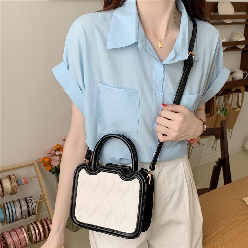 

Высококачественная нишевая дизайнерская сумка-бисквит женская 2024 новый сезон модная универсальная сумка-мессенджер маленькая сумка прилив чёрный