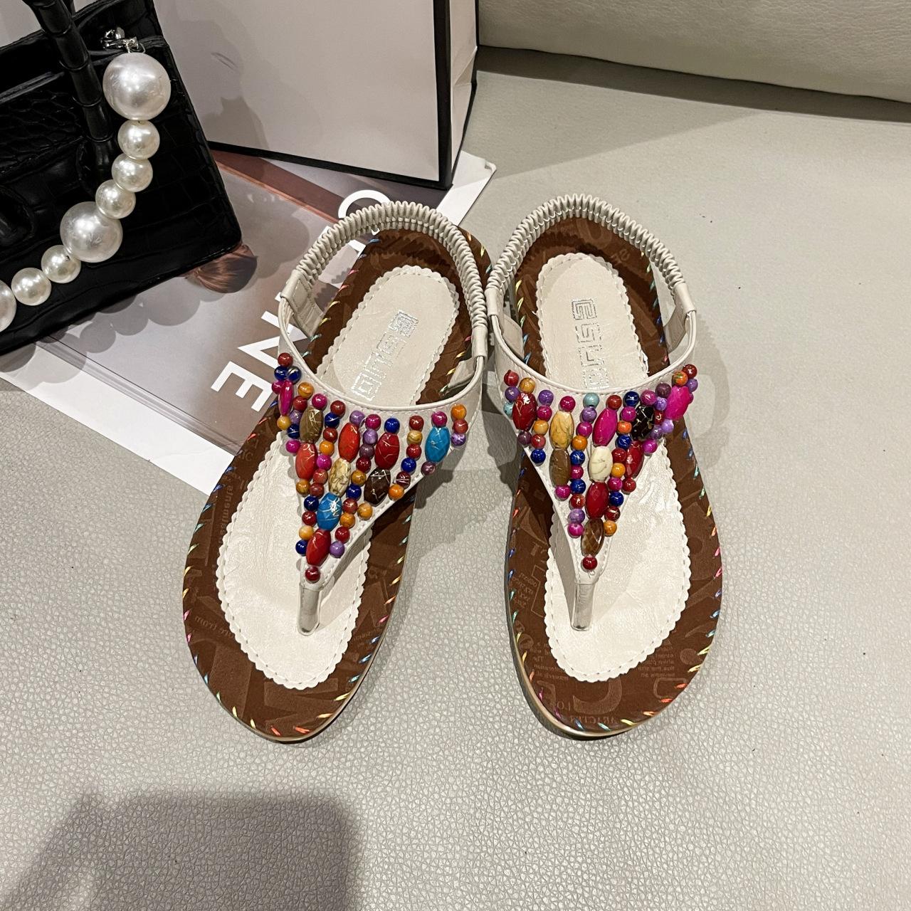 

Сандалии женские 2025 новые женские туфли весна богемный щипковые сандалии на плоской подошве женские бисерные пляжные туфли женский взрыв 36 бежевый