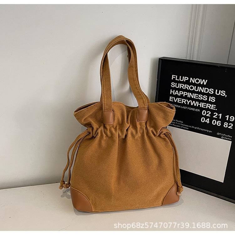 

2025 New Oxford Cloth Large Capacity Tote Bag Fashion Versatile Handbag Casual Drawstring Folded Shoulder Bag Tide коричневый