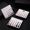 12 Pairs of Zircon Stud Earrings: Pearl, Flower & Bow Designs