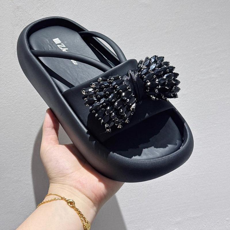 JX bow rhinestone thick-soled one-word slippers for women to wear new fashionable versatile casual beach slippers