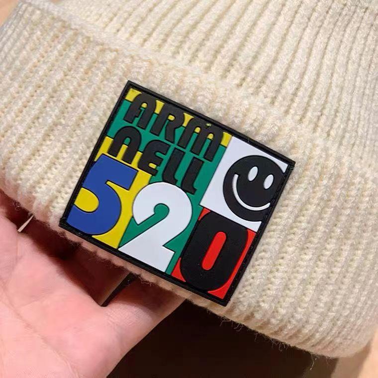 Student Wollmütze Koreanische Version Herbst und Winter Mode warm Buchstabenstickerei Strickmütze Damen süß cool Wind Winter Ohrenschutz Kältemütze