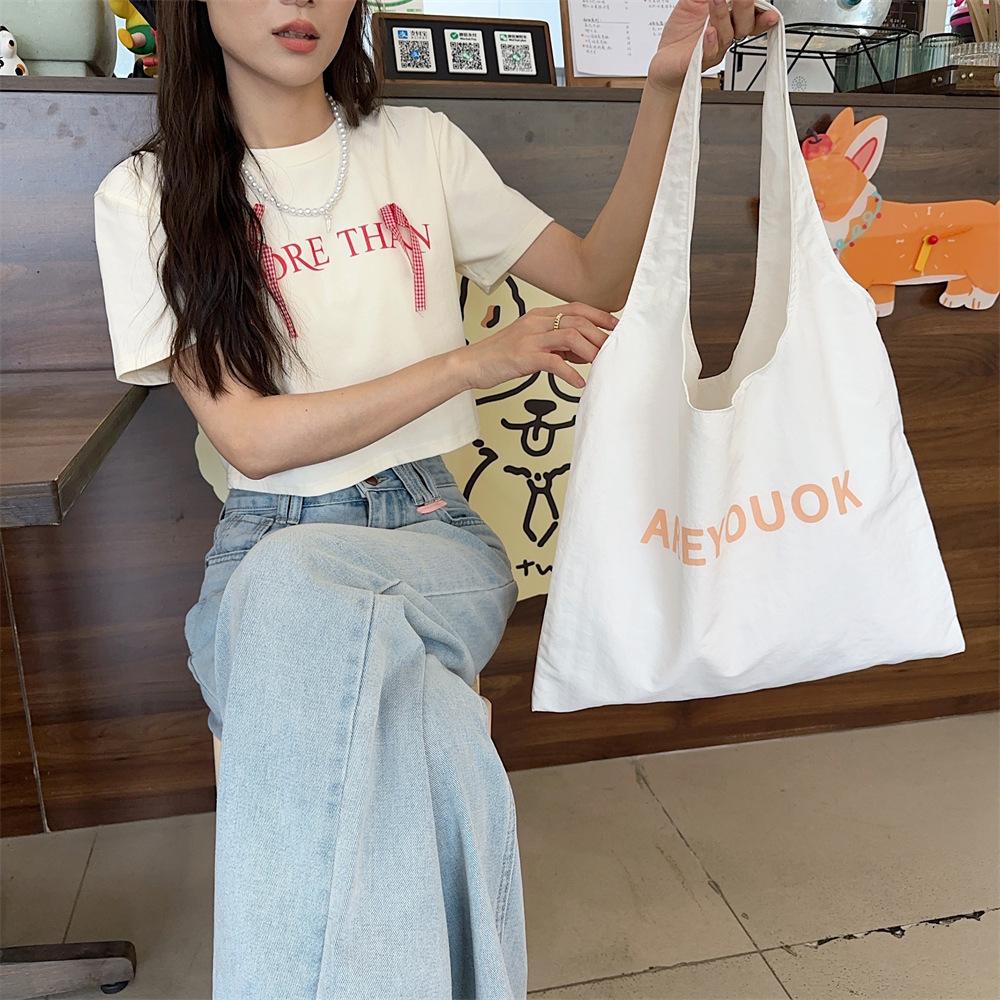 

Новая сумка через плечо с буквенным принтом, большая вместимость, универсальная тканевая сумка, женская холщовая сумка, сумка для покупок белый