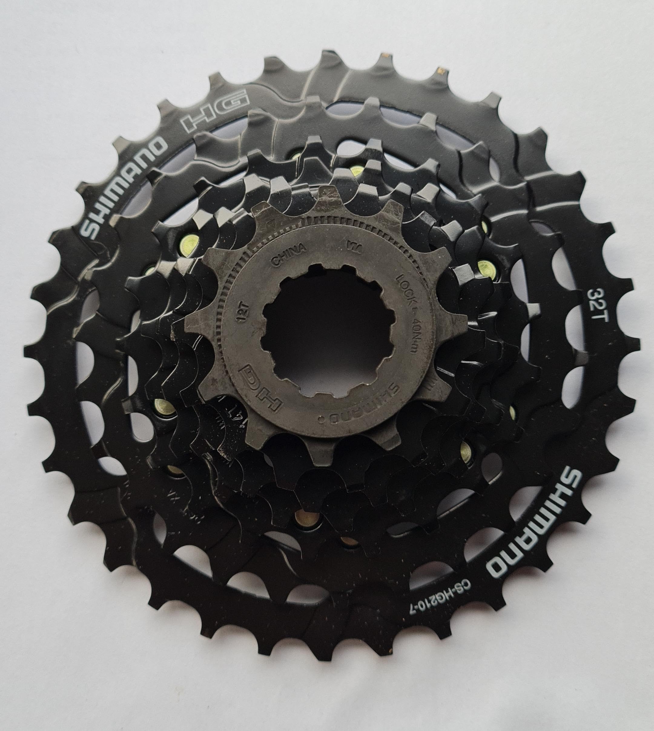 

Shimano HG Cassette Compatible with Freewheel ECSHG2107232 CS-HG210 7-Speed Sprocket, 12-32T, 7-Speed, HG-M Body, серый