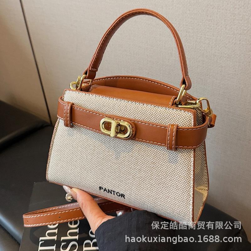 Commuter large-capacity canvas bag women's 2025 new popular and popular versatile messenger bag fashion contrasting handbag