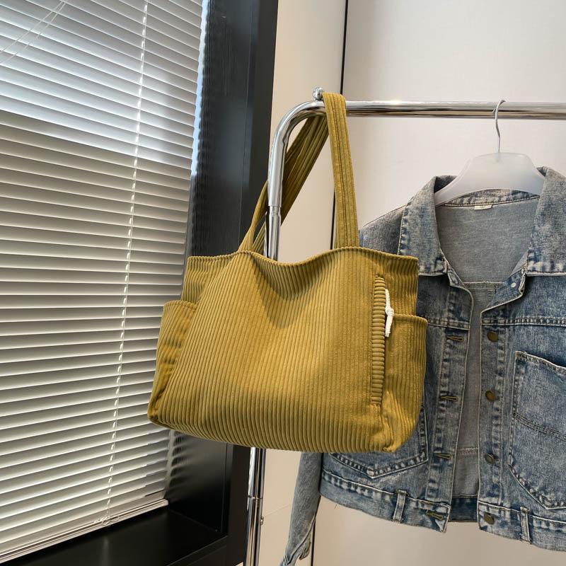 

Новая вместительная сумка-тоут для поездок на работу, студенческая сумка-мессенджер через плечо для занятий, нишевая универсальная вельветовая женская сумка single package жёлтый