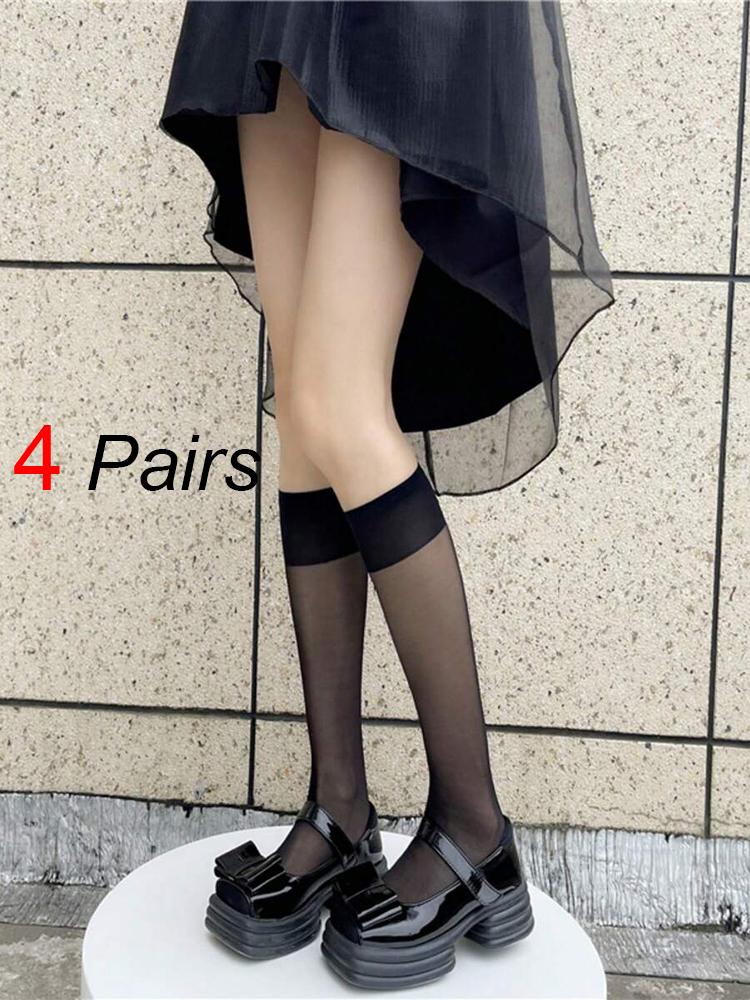 

4 пары черно-белых полупрозрачных нейлоновых носков. Классические, универсальные, подходят для повседневной носки. Они удобные, дышащие, повседневные носки One Size